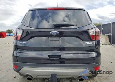 2018 Ford Escape Titanium z USA, uszkodzony, nr VIN 1FMCU9J98JUA01437
